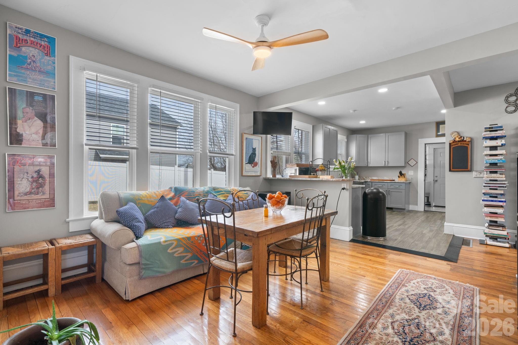 115 12th Street Southwest Hickory, NC 28602 - Photo 10 of 35 a living room with furniture and a wooden floor