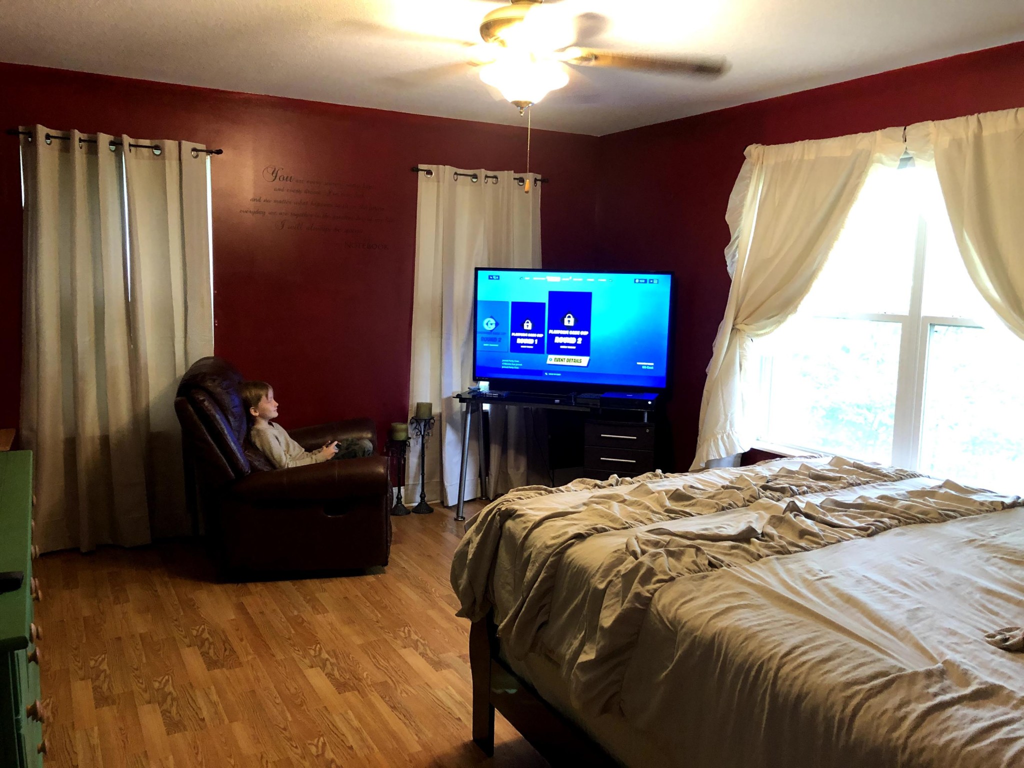 915 Sand Cut Road Oneida, TN 37841 - Photo 11 of 19 a bed sitting in a bedroom next to a window