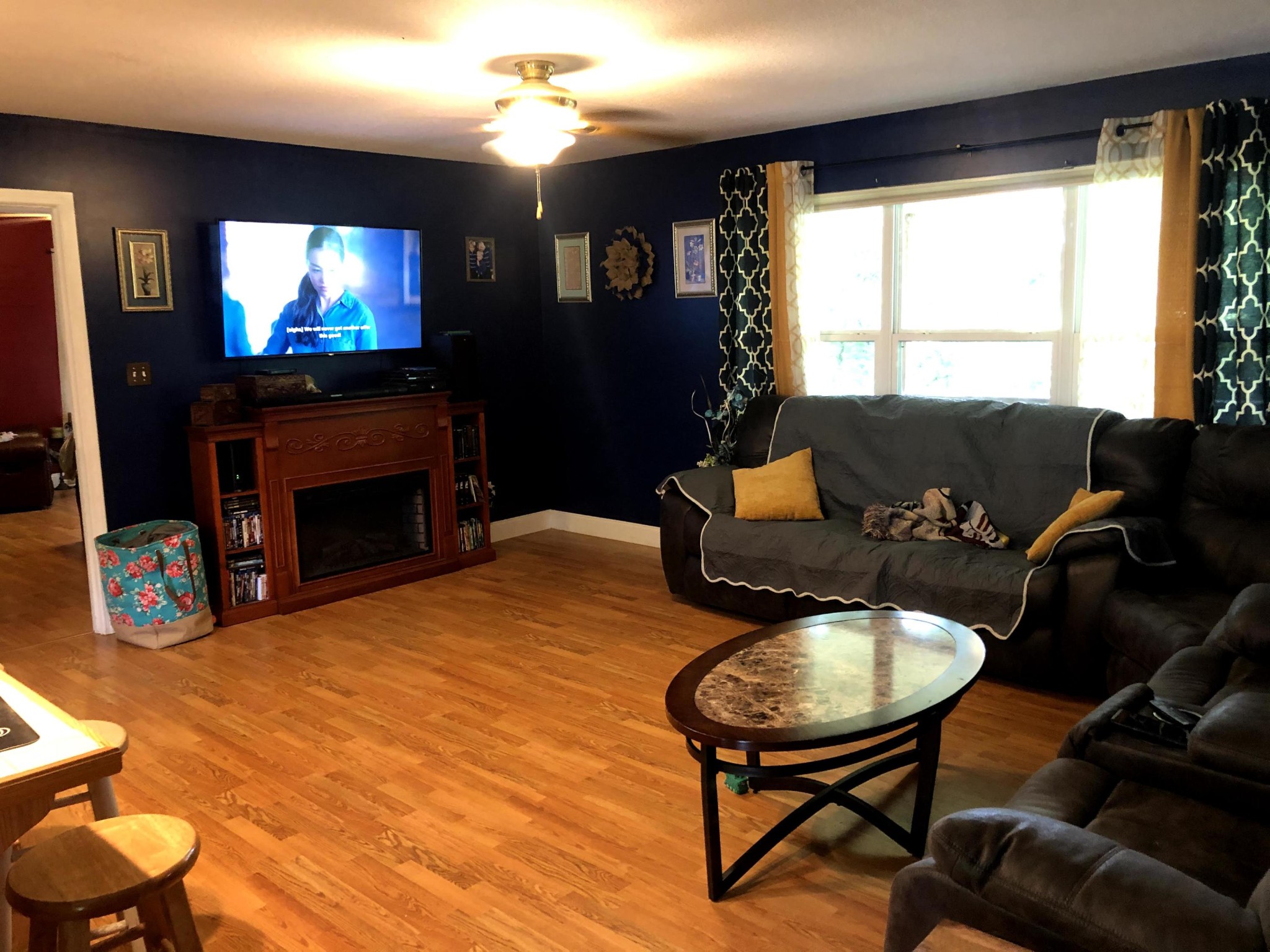 915 Sand Cut Road Oneida, TN 37841 - Photo 8 of 19 a living room with furniture and a fireplace