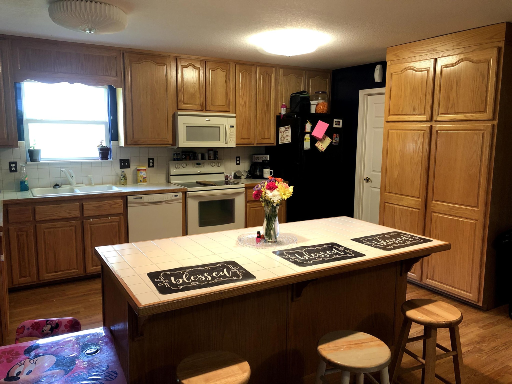 915 Sand Cut Road Oneida, TN 37841 - Photo 9 of 19 a kitchen with a sink a stove a refrigerator and a stove