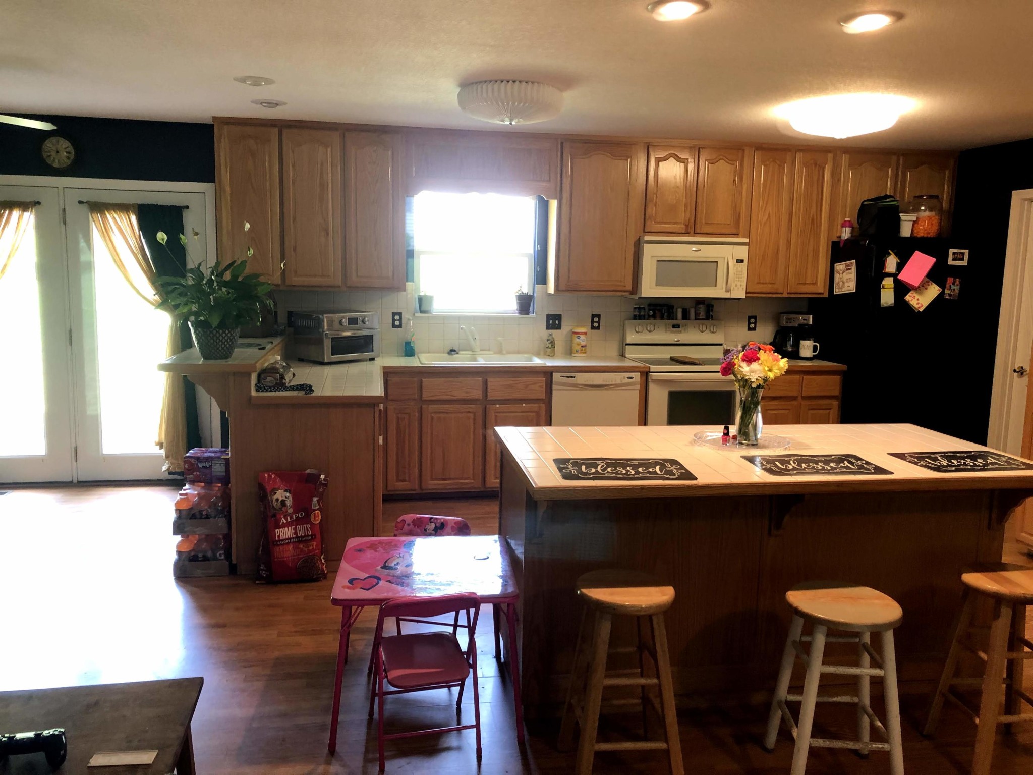 915 Sand Cut Road Oneida, TN 37841 - Photo 10 of 19 a kitchen with a sink cabinets and wooden floor