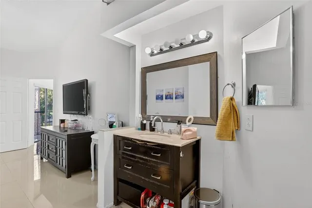 a bathroom with a sink and a mirror