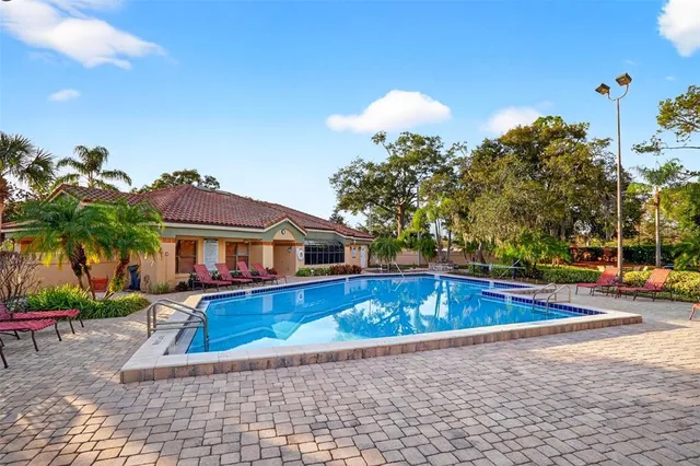 a view of a house with swimming pool