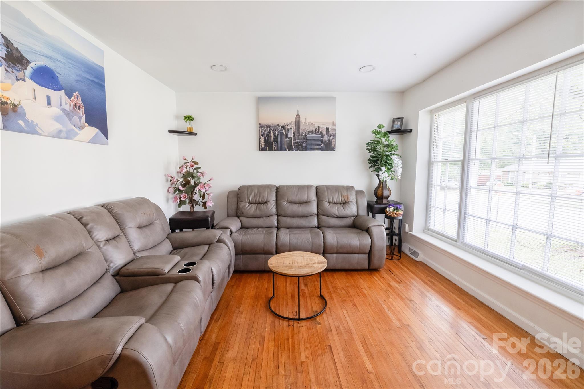 2545 Cedarwild Road Charlotte, NC 28212 - Photo 11 of 25 a living room with furniture and a large window