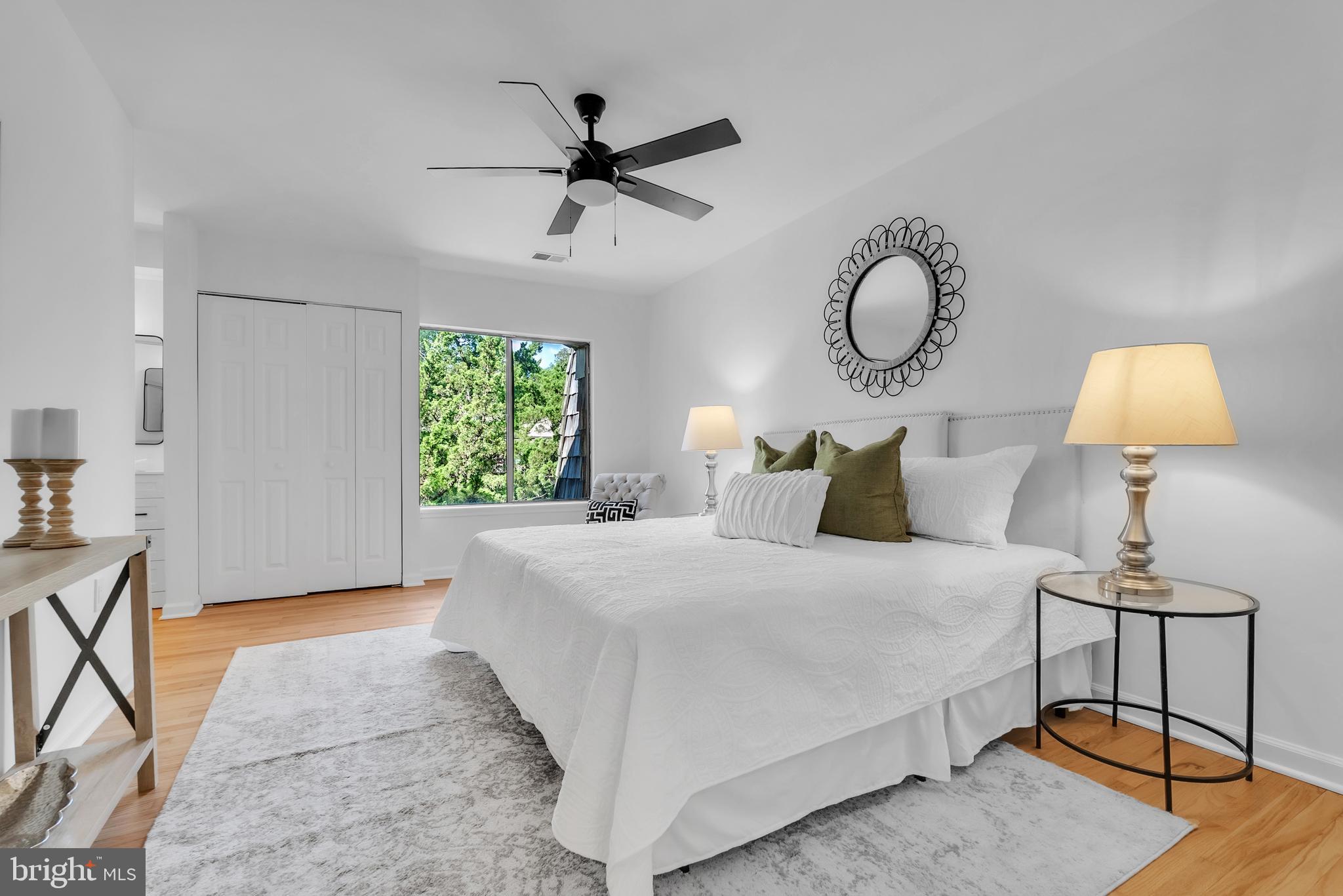 8074 Inverness Ridge Road Potomac, MD 20854 - Photo 18 of 41 a bedroom with a bed and window