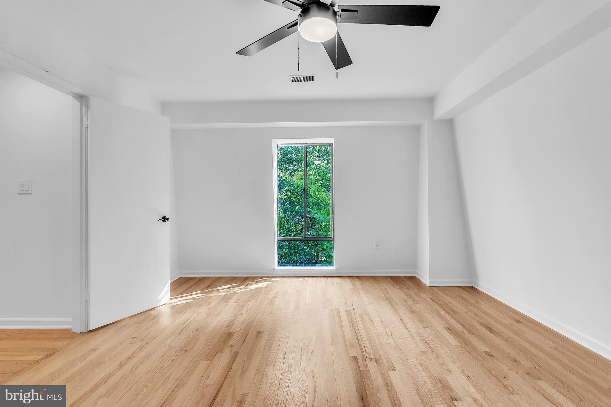 8074 Inverness Ridge Road Potomac, MD 20854 - Photo 24 of 41 a view of empty room with wooden floor