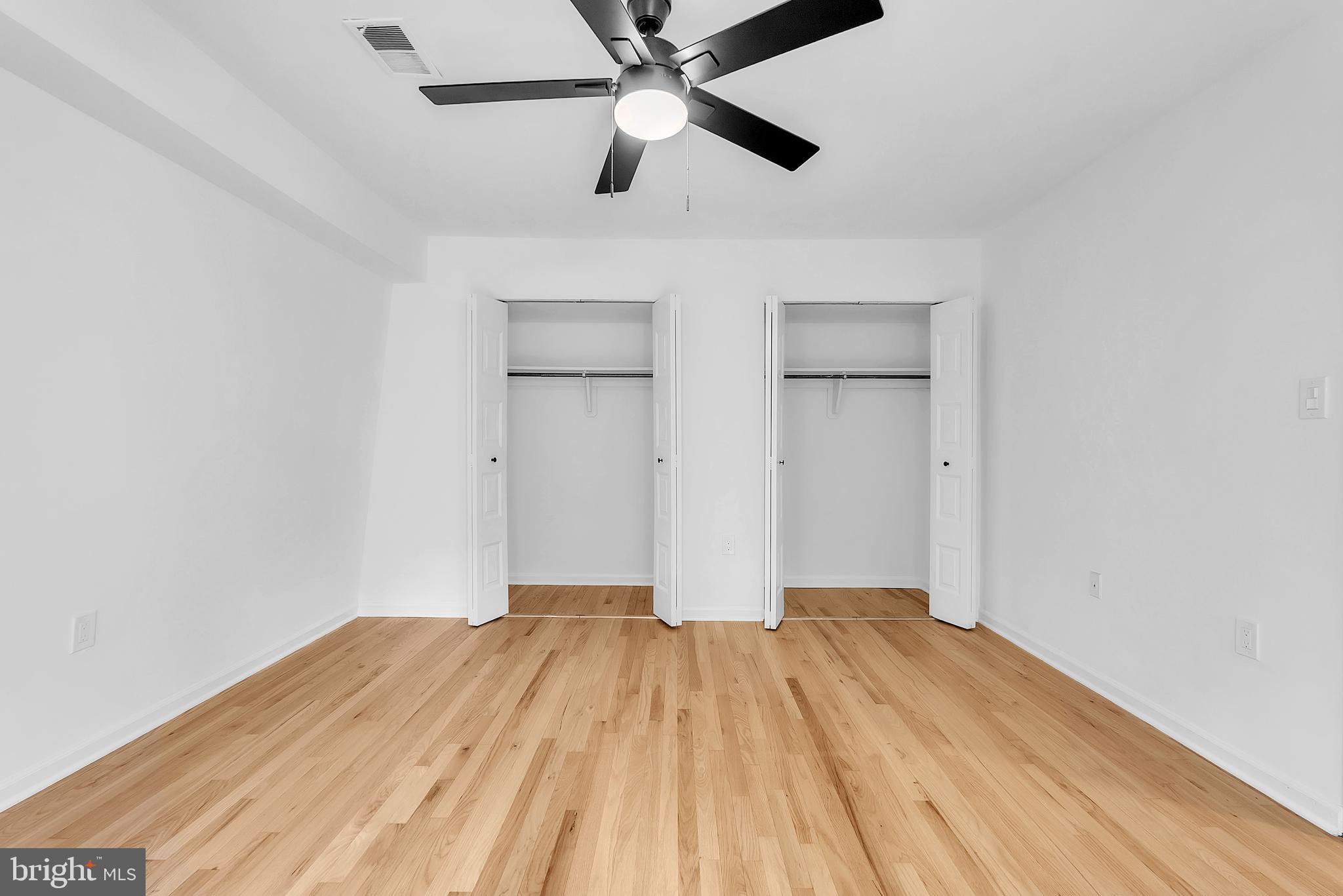 8074 Inverness Ridge Road Potomac, MD 20854 - Photo 25 of 41 a view of empty room with wooden floor