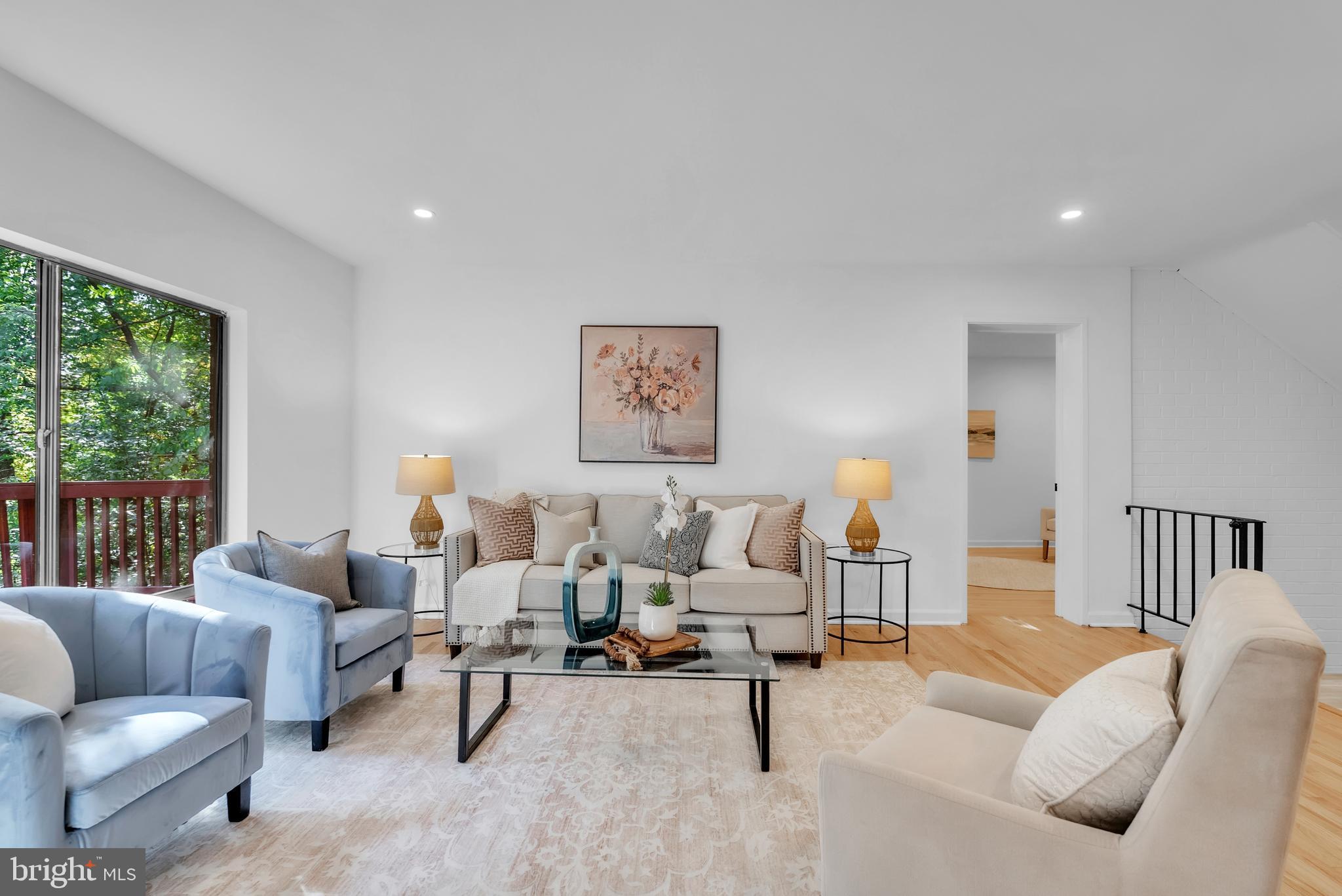 8074 Inverness Ridge Road Potomac, MD 20854 - Photo 5 of 41 a living room with furniture and a large window