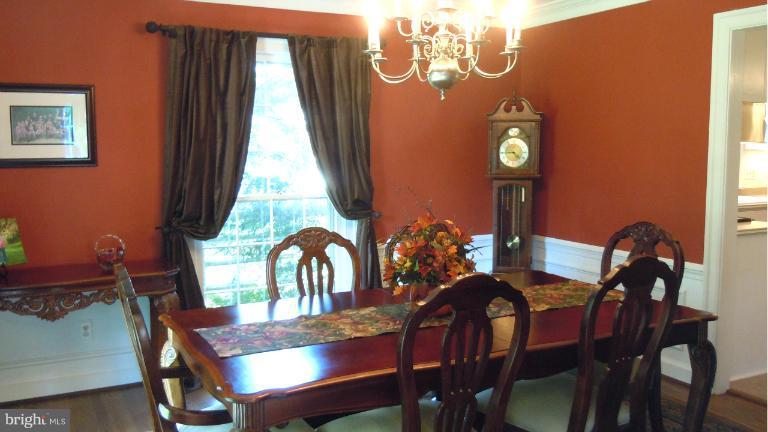 15613 Jones Lane Gaithersburg, MD 20878 - Photo 15 of 21 a view of a dining room with furniture and window