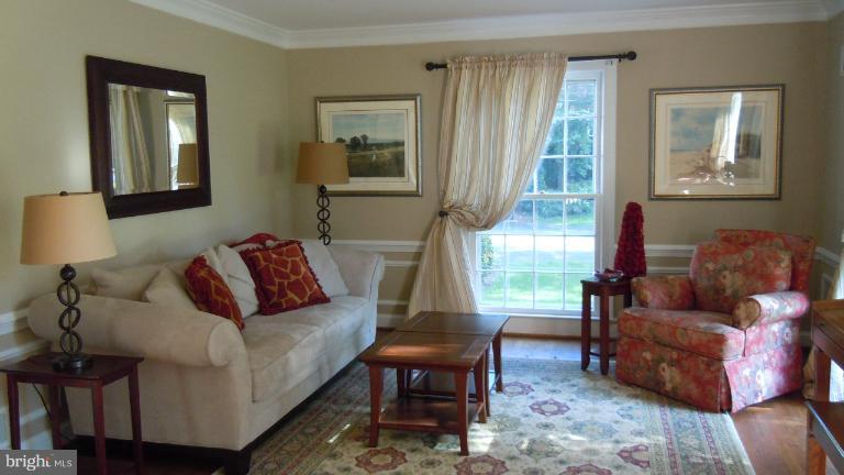 15613 Jones Lane Gaithersburg, MD 20878 - Photo 18 of 21 a living room with furniture and a window