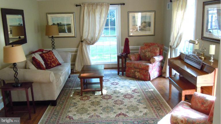 15613 Jones Lane Gaithersburg, MD 20878 - Photo 8 of 21 a living room with furniture and a window