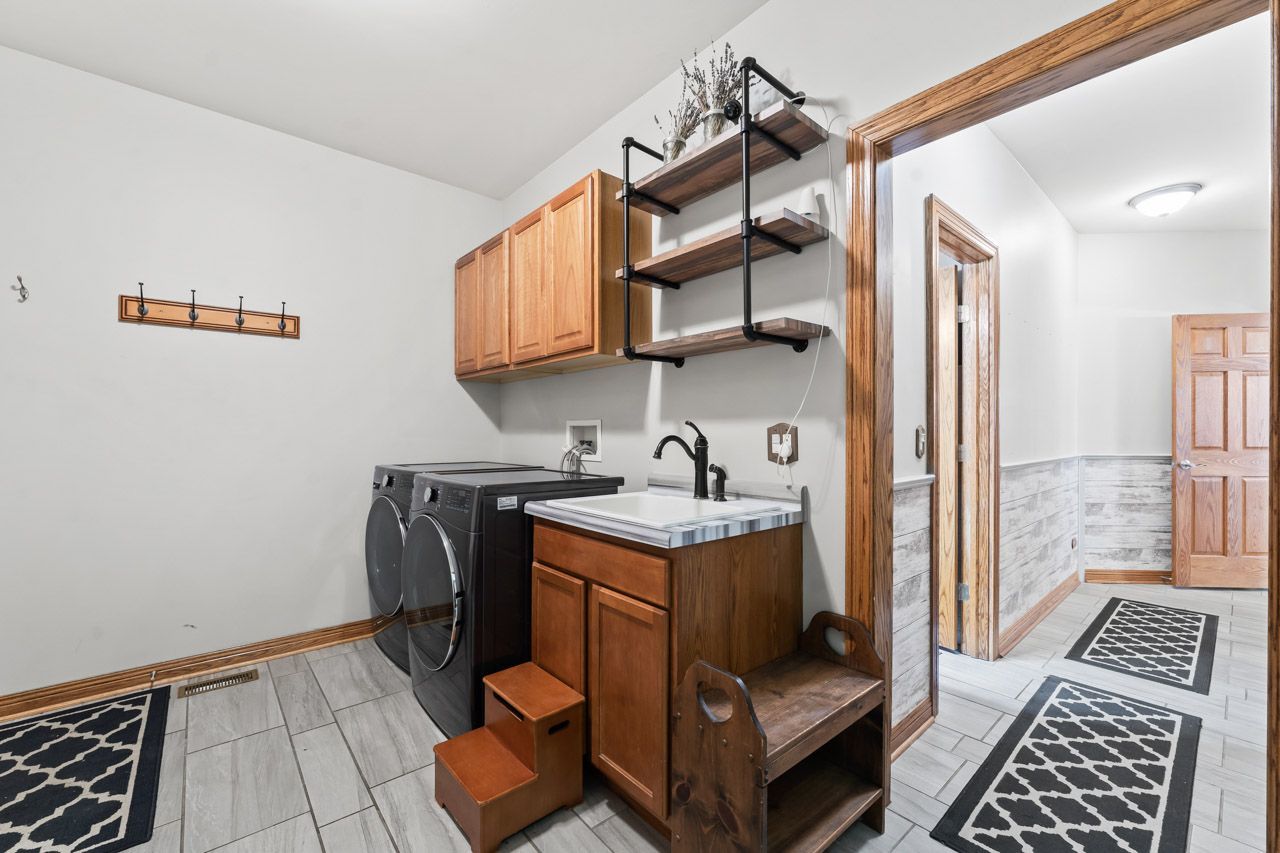 9307 Daniel Lane Spring Grove, IL 60081 - Photo 38 of 70 a kitchen with stainless steel appliances granite countertop a sink and a cabinets