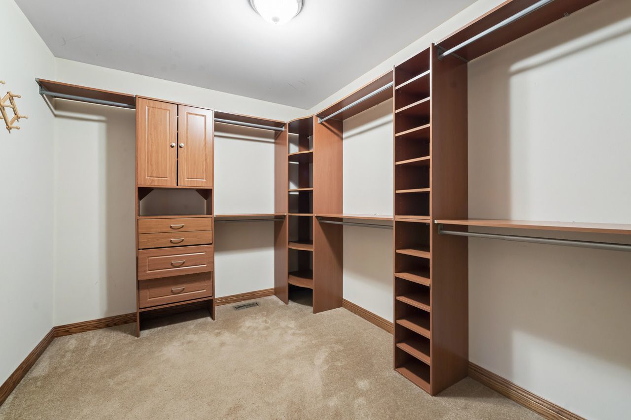 9307 Daniel Lane Spring Grove, IL 60081 - Photo 43 of 70 a view of walk in closet with clothes