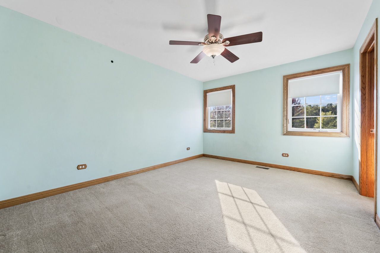 9307 Daniel Lane Spring Grove, IL 60081 - Photo 44 of 70 a view of an empty room with a window