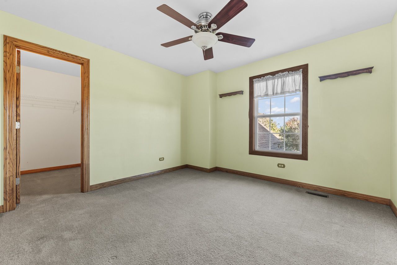 9307 Daniel Lane Spring Grove, IL 60081 - Photo 49 of 70 a view of an empty room with a window