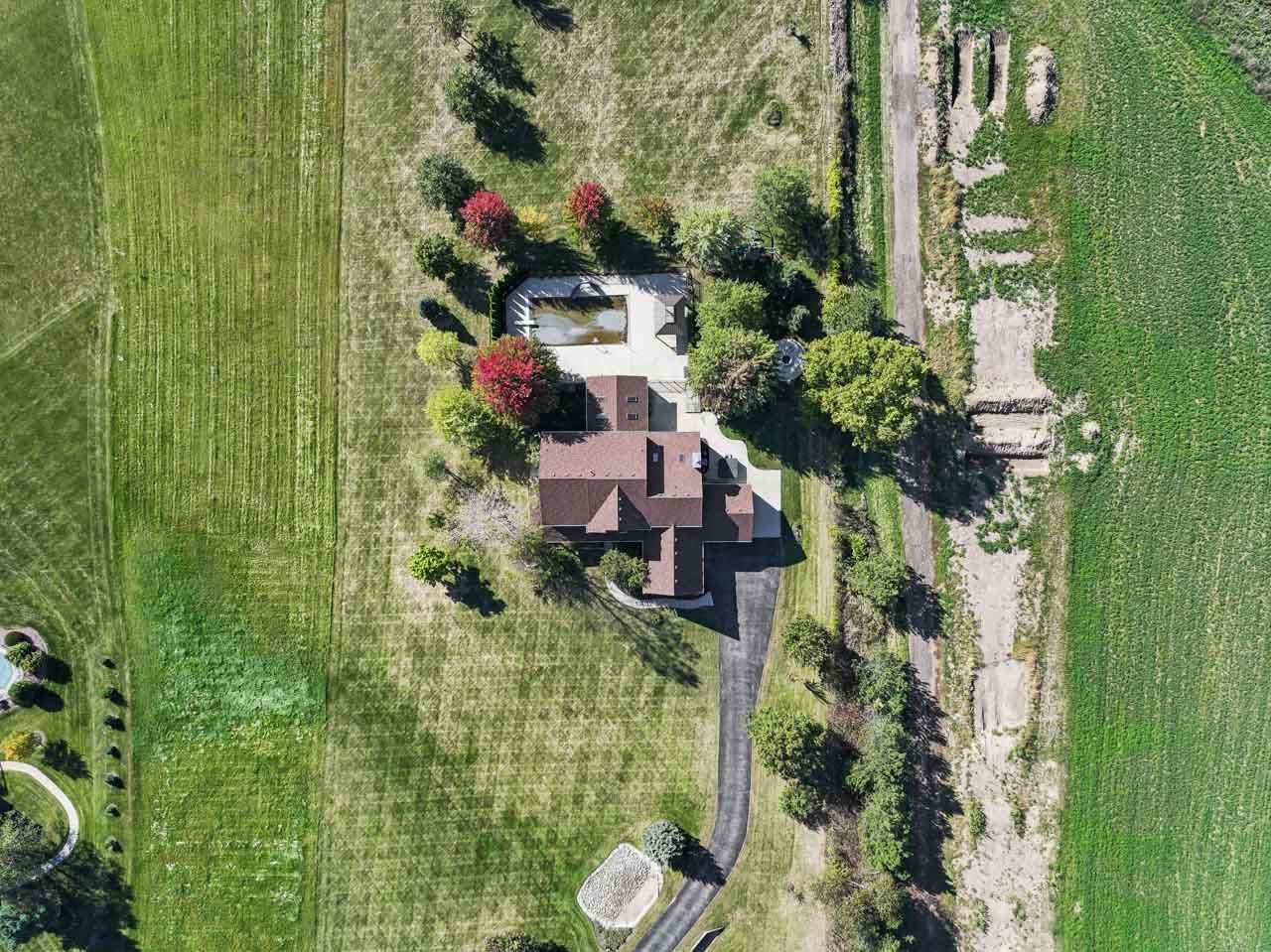 9307 Daniel Lane Spring Grove, IL 60081 - Photo 67 of 70 a backyard of a house with lots of green space and outdoor seating