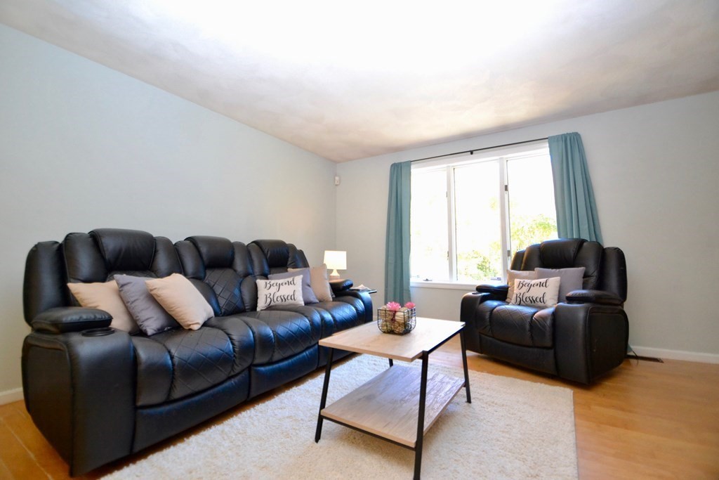 43 Andrews Farm Road Boxford, MA 01921 - Photo 8 of 21 a living room with furniture and a window