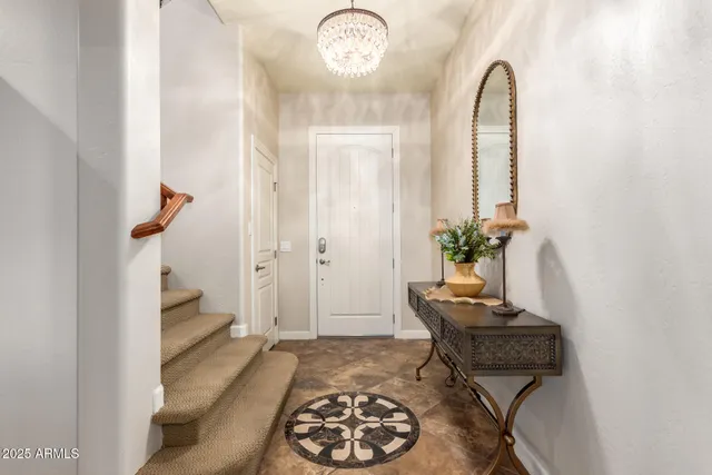 a large kitchen with stainless steel appliances granite countertop a stove and a sink