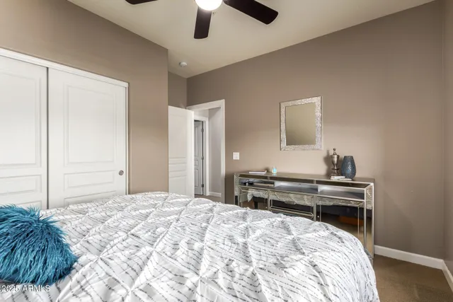 a view of a chairs and tables in patio