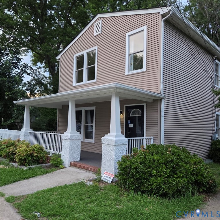124 Lipscomb Street Richmond, VA 23224 - Photo 1 of 10 Two-story residence featuring light brown horizont