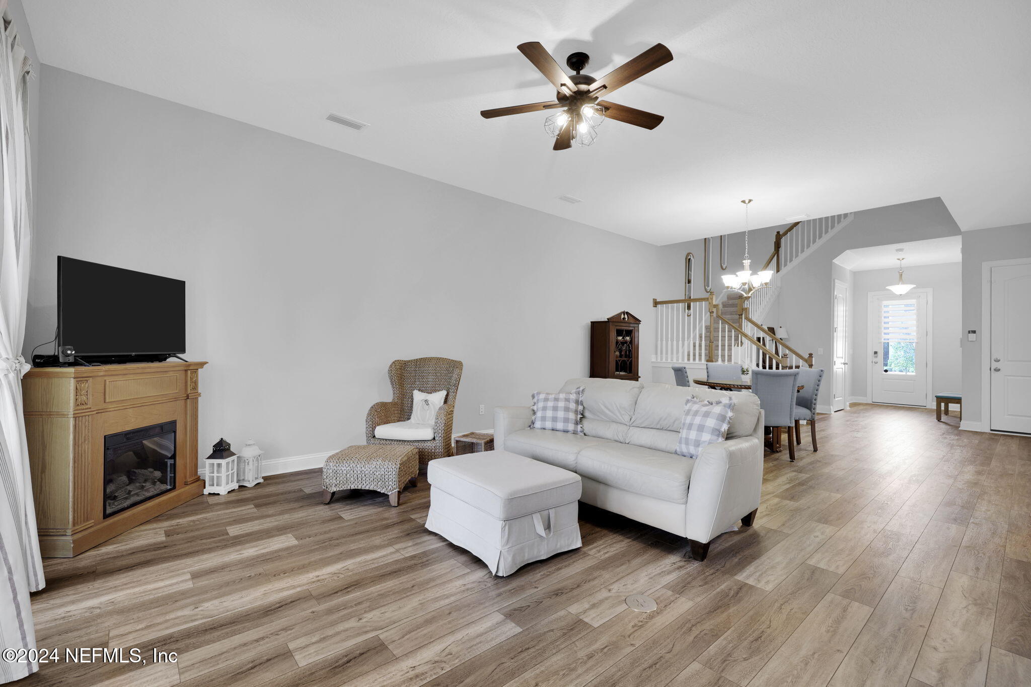 217 Liberty Bell Road Ponte Vedra, FL 32081 - Photo 13 of 50 a living room with furniture fireplace and flat screen tv
