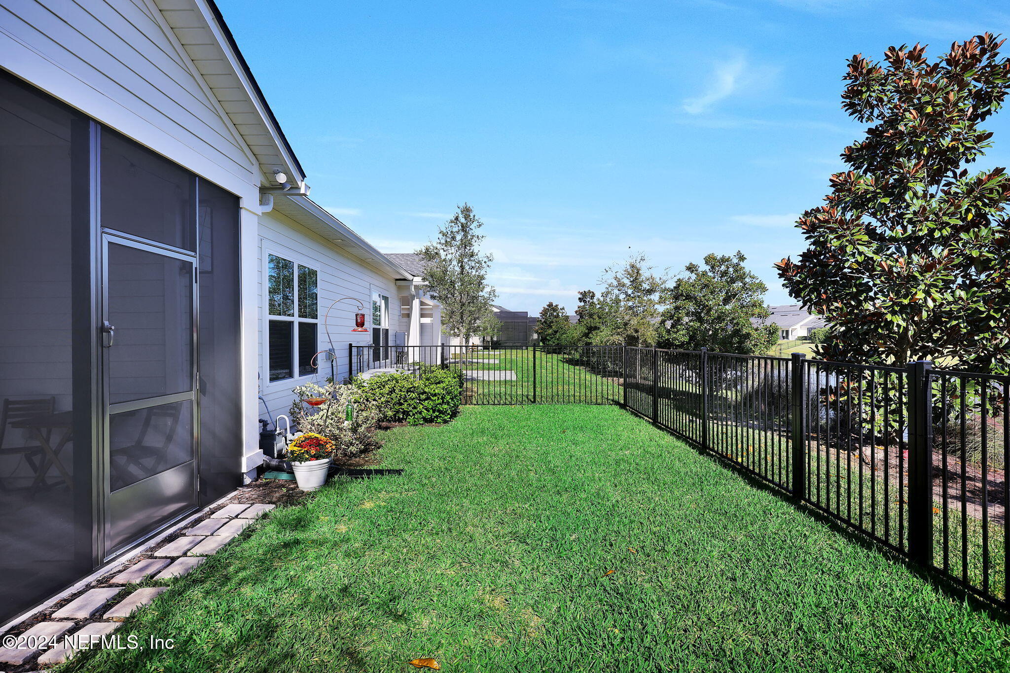217 Liberty Bell Road Ponte Vedra, FL 32081 - Photo 29 of 50 a view of a house with backyard and garden