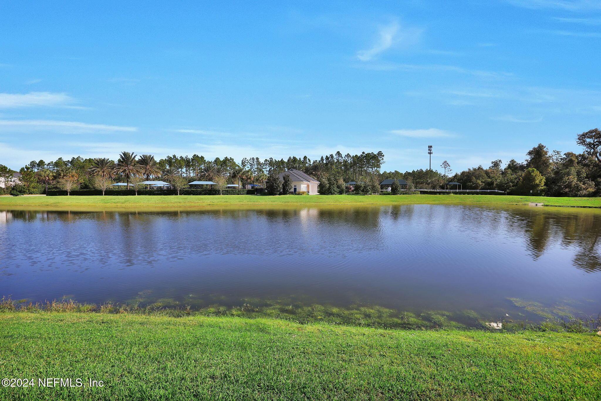 217 Liberty Bell Road Ponte Vedra, FL 32081 - Photo 33 of 50 a view of a lake with houses in the background