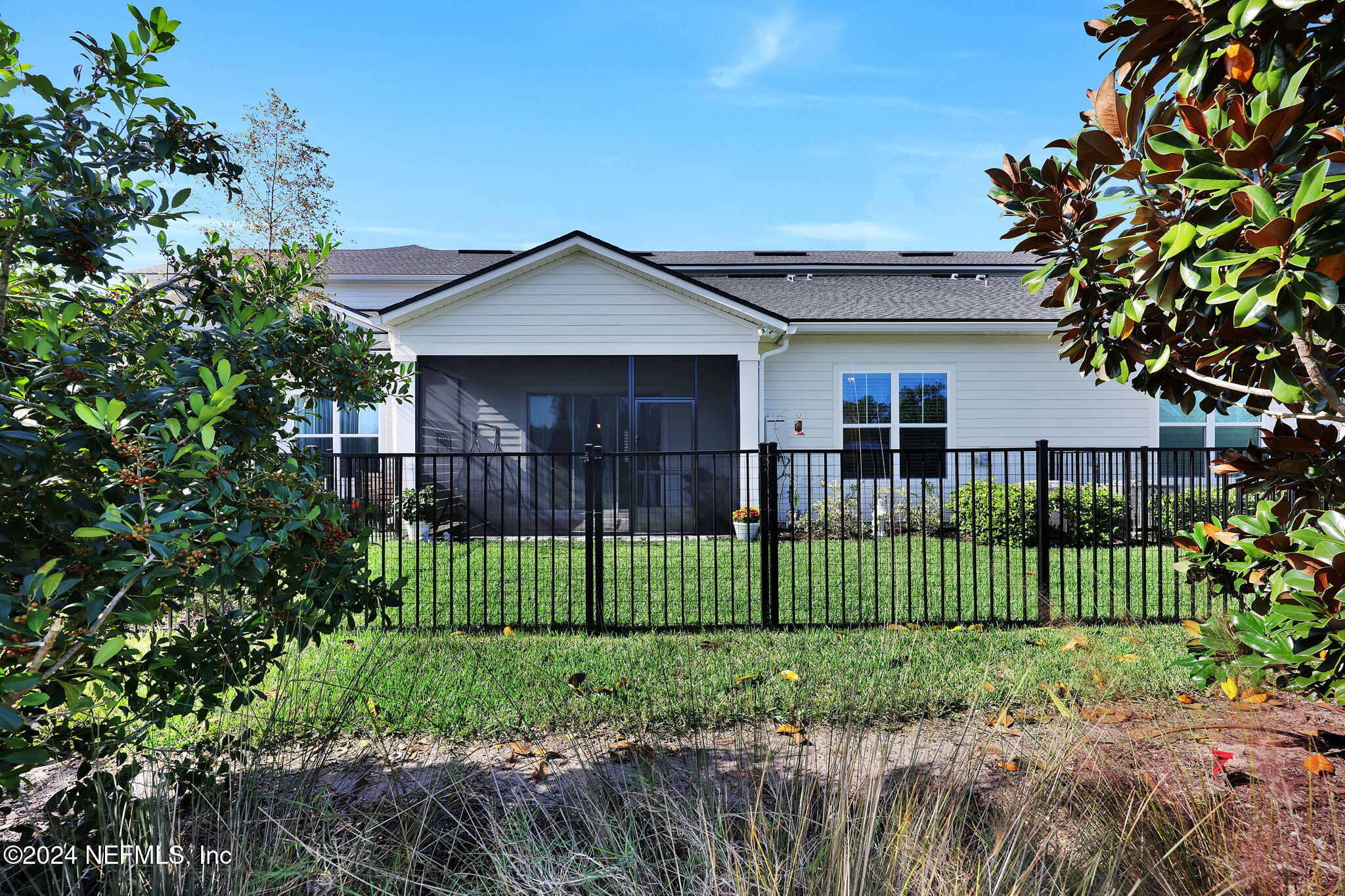 217 Liberty Bell Road Ponte Vedra, FL 32081 - Photo 34 of 50 a front view of a house with a garden