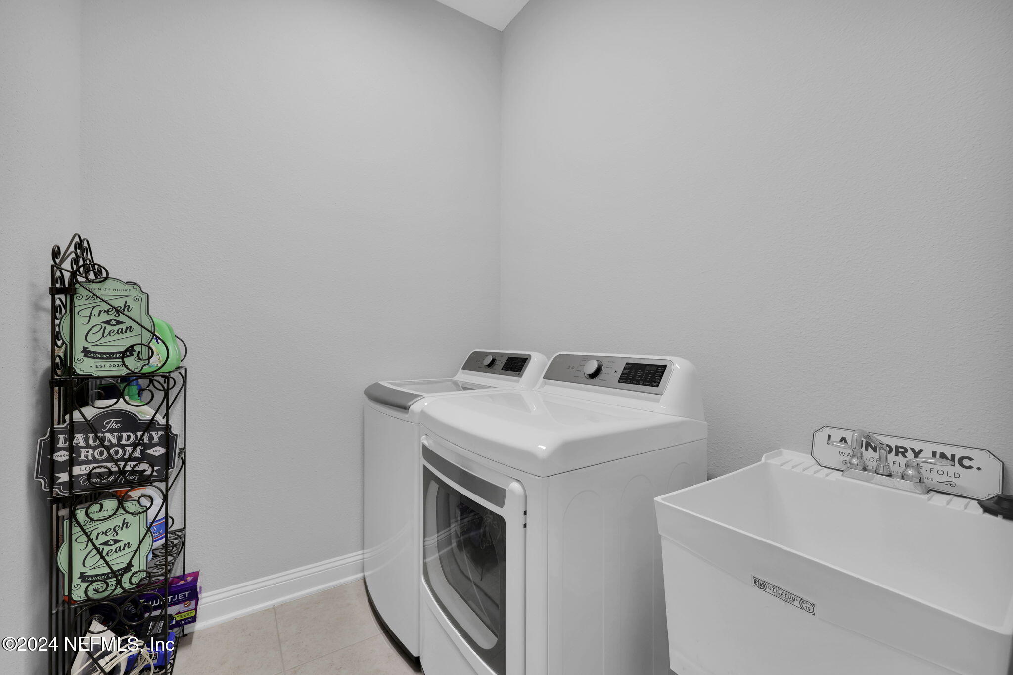 217 Liberty Bell Road Ponte Vedra, FL 32081 - Photo 36 of 50 a utility room with dryer and washer