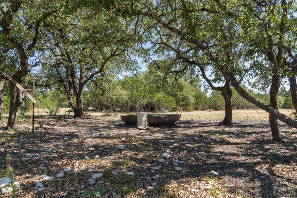 24 County Road 24 Junction, TX 76849 - Photo 14 of 37 a view of a outdoor space with fountain