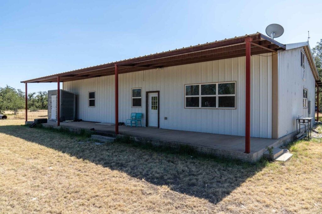 24 County Road 24 Junction, TX 76849 - Photo 16 of 37 a view of a house with backyard and garden