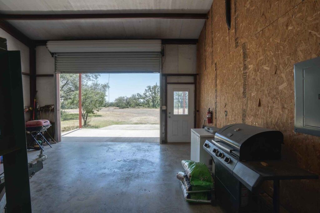 24 County Road 24 Junction, TX 76849 - Photo 30 of 37 a living room with furniture and a gate