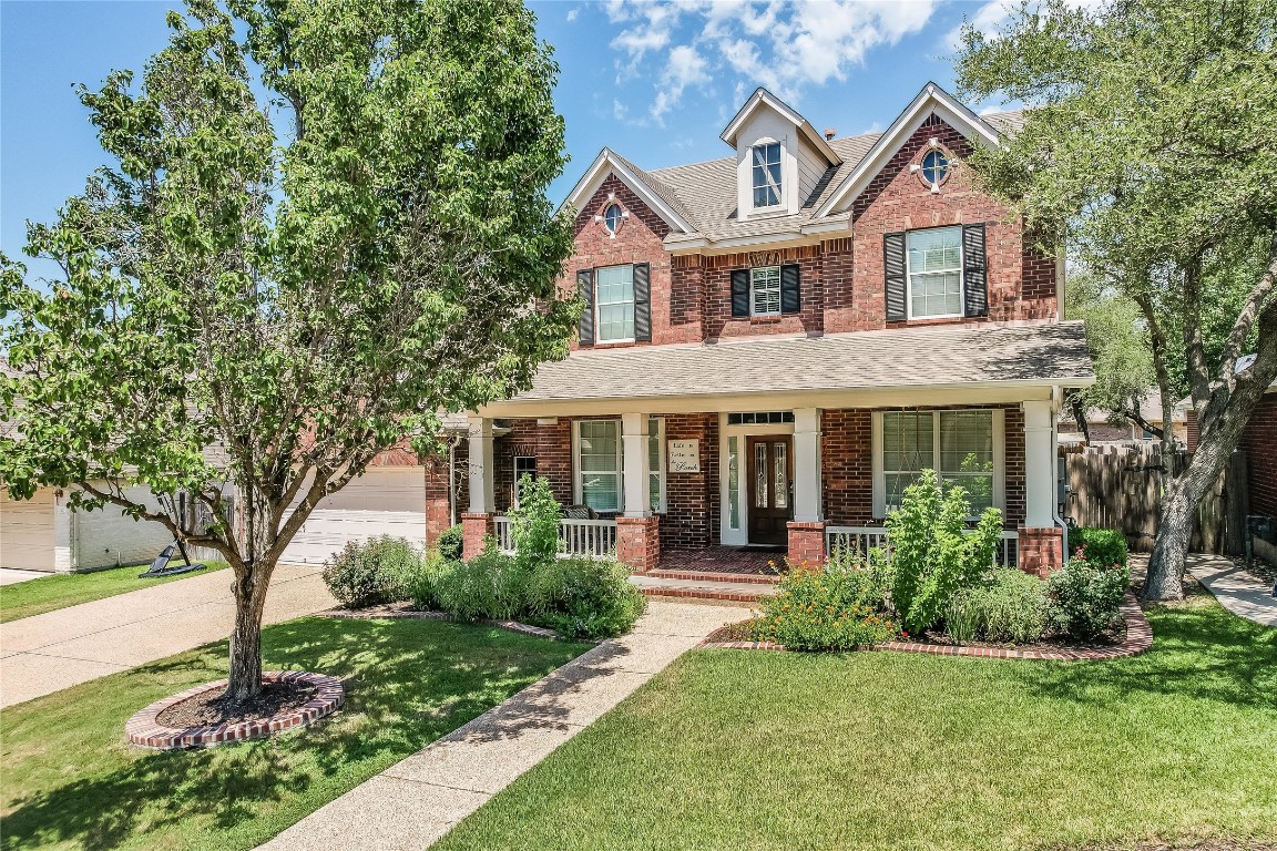 1723 Nelson Ranch Loop Cedar Park, TX 78613 - Photo 1 of 1 front view of a house with a yard