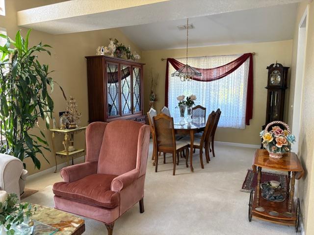8317 Honeycomb Way Sacramento, CA 95828 - Photo 2 of 7 a view of a dining room with furniture and window