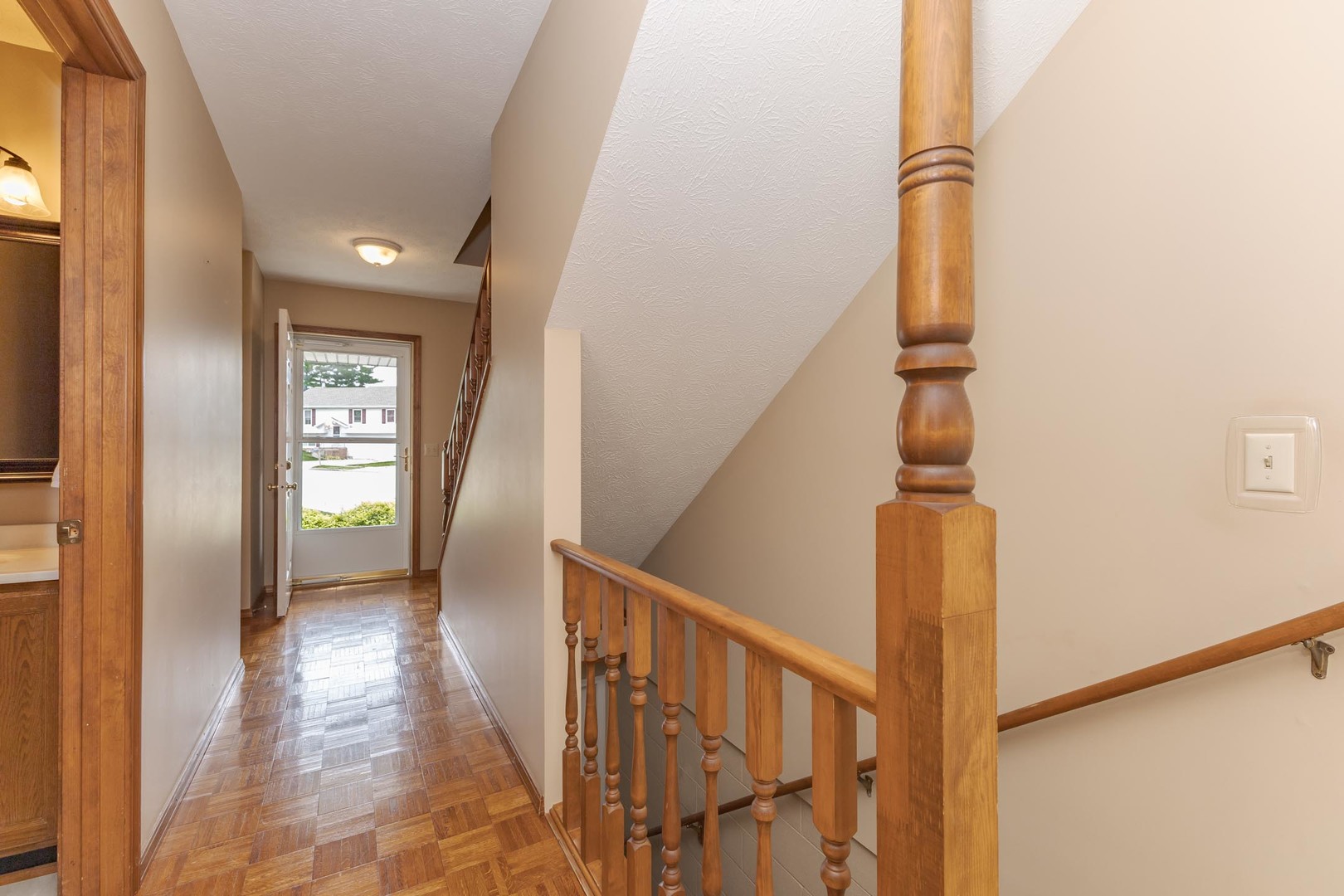 502 Wittenberg Court Normal, IL 61761 - Photo 11 of 41 a view of hallway with stairs