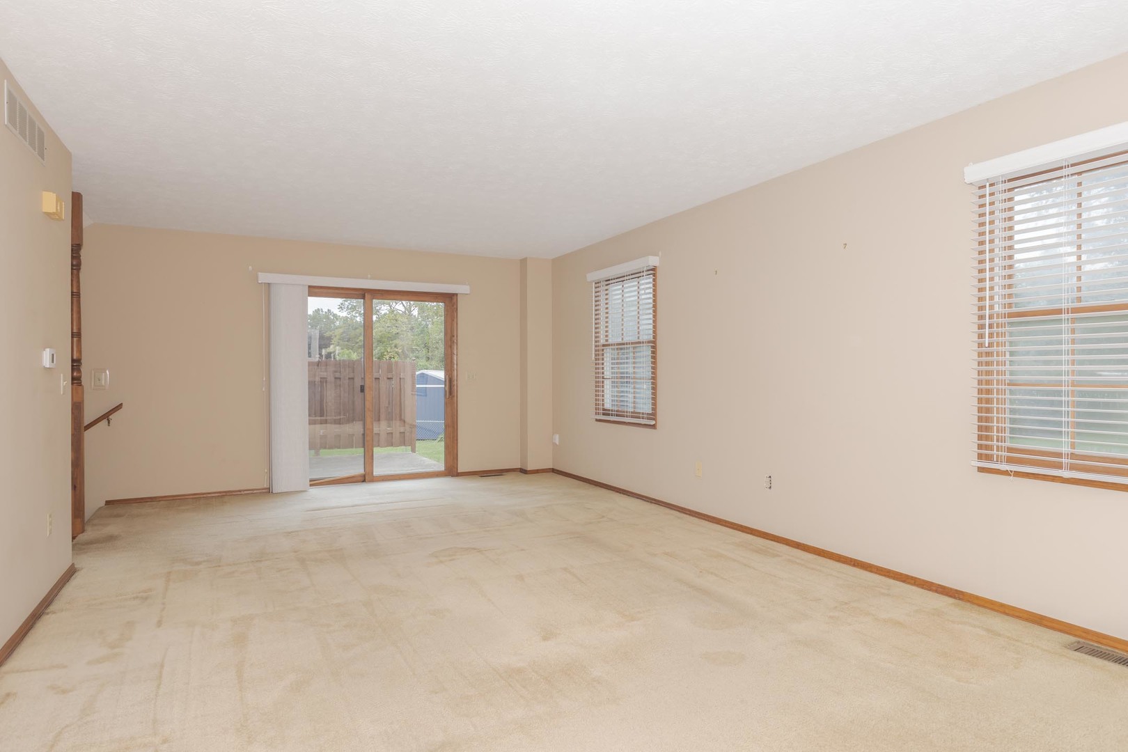 502 Wittenberg Court Normal, IL 61761 - Photo 14 of 41 an empty room with windows