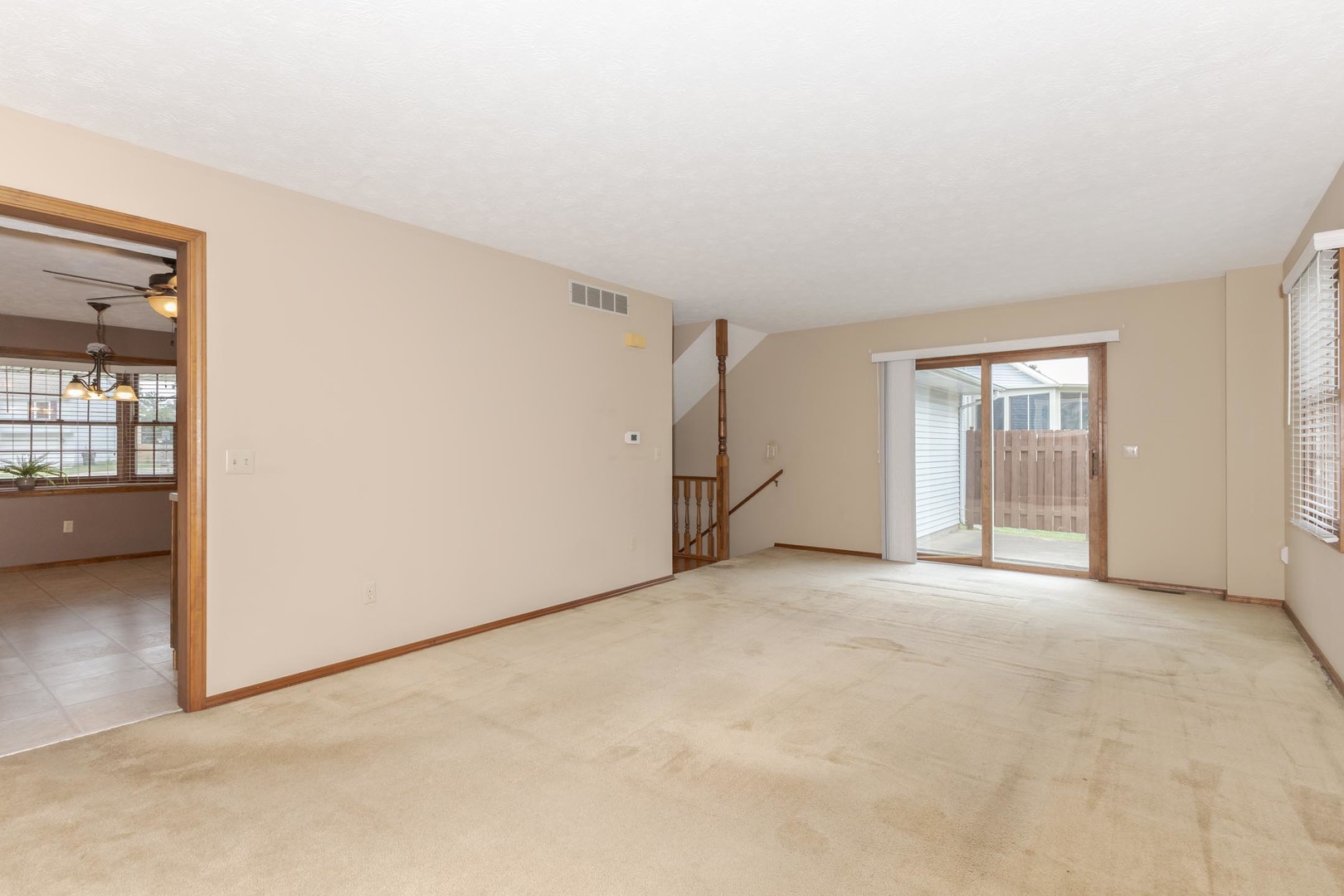 502 Wittenberg Court Normal, IL 61761 - Photo 15 of 41 an empty room with windows