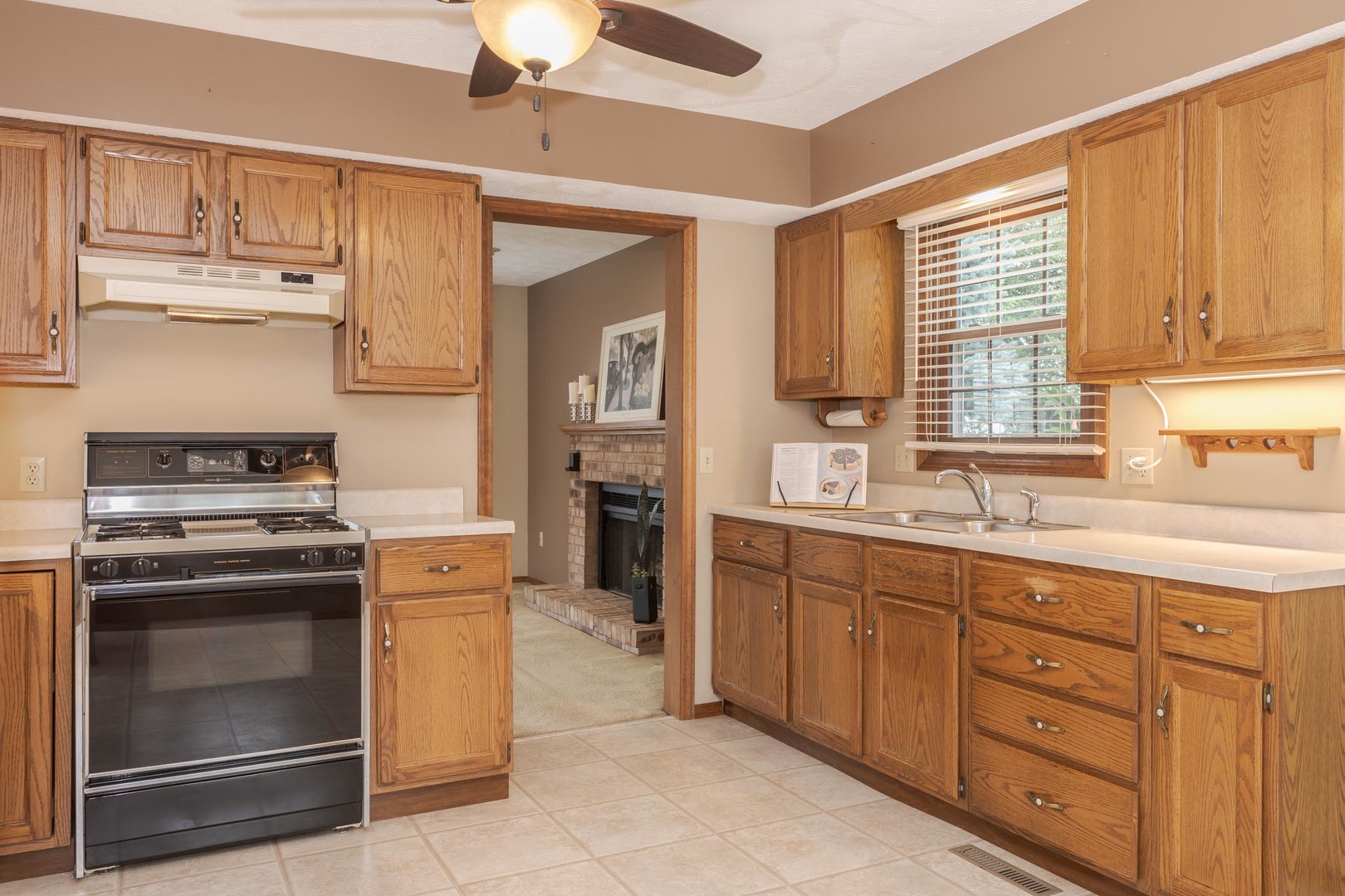 502 Wittenberg Court Normal, IL 61761 - Photo 18 of 41 a kitchen with stainless steel appliances granite countertop a sink and a stove