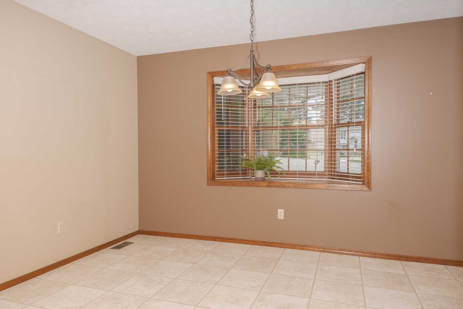 502 Wittenberg Court Normal, IL 61761 - Photo 20 of 41 a view of an empty room with a window