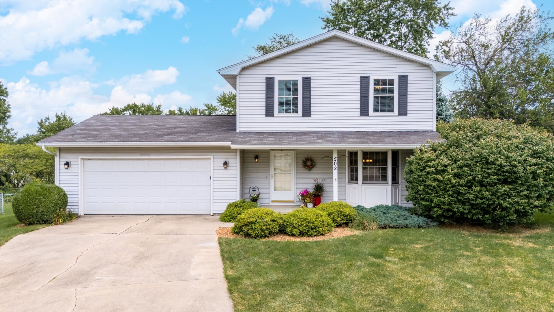 502 Wittenberg Court Normal, IL 61761 - Photo 2 of 41 a front view of a house with garden
