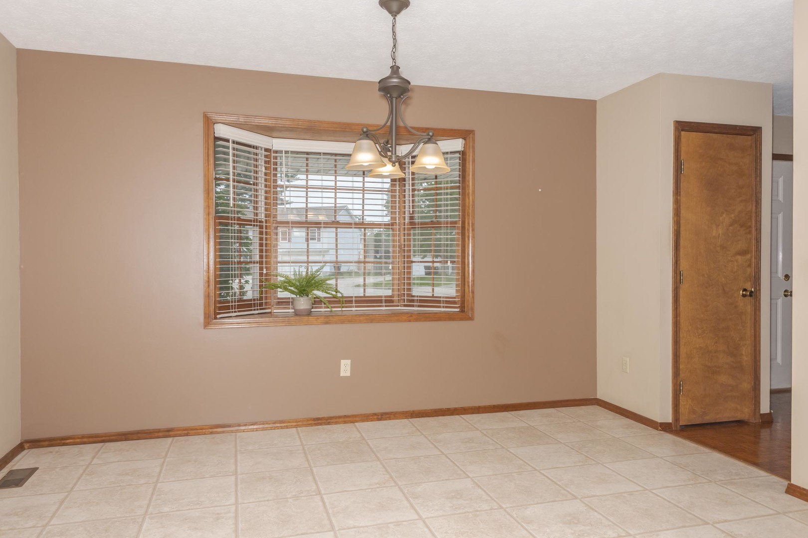 502 Wittenberg Court Normal, IL 61761 - Photo 22 of 41 a view of an empty room with a window