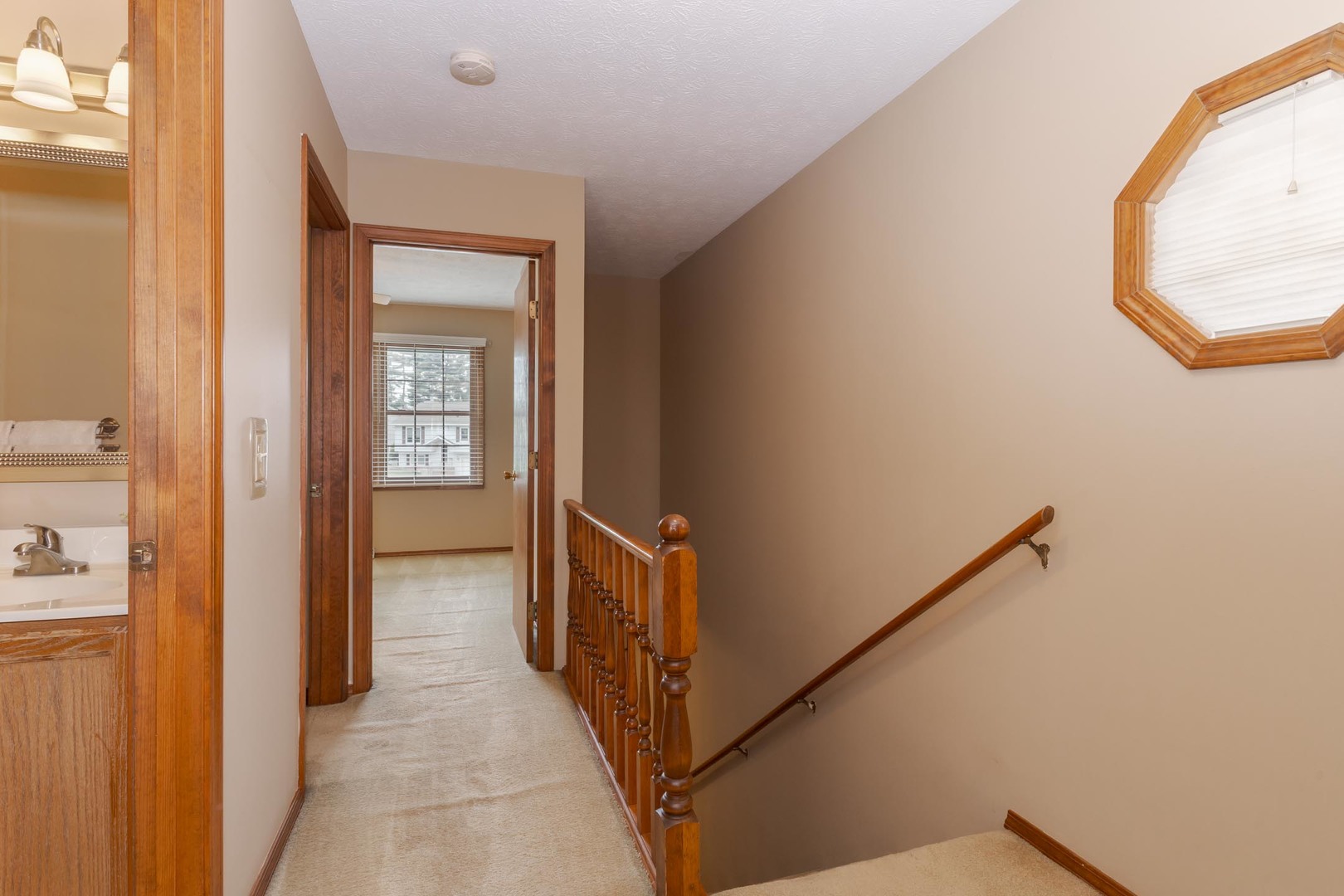 502 Wittenberg Court Normal, IL 61761 - Photo 27 of 41 a view of a hallway with wooden floor and entryway