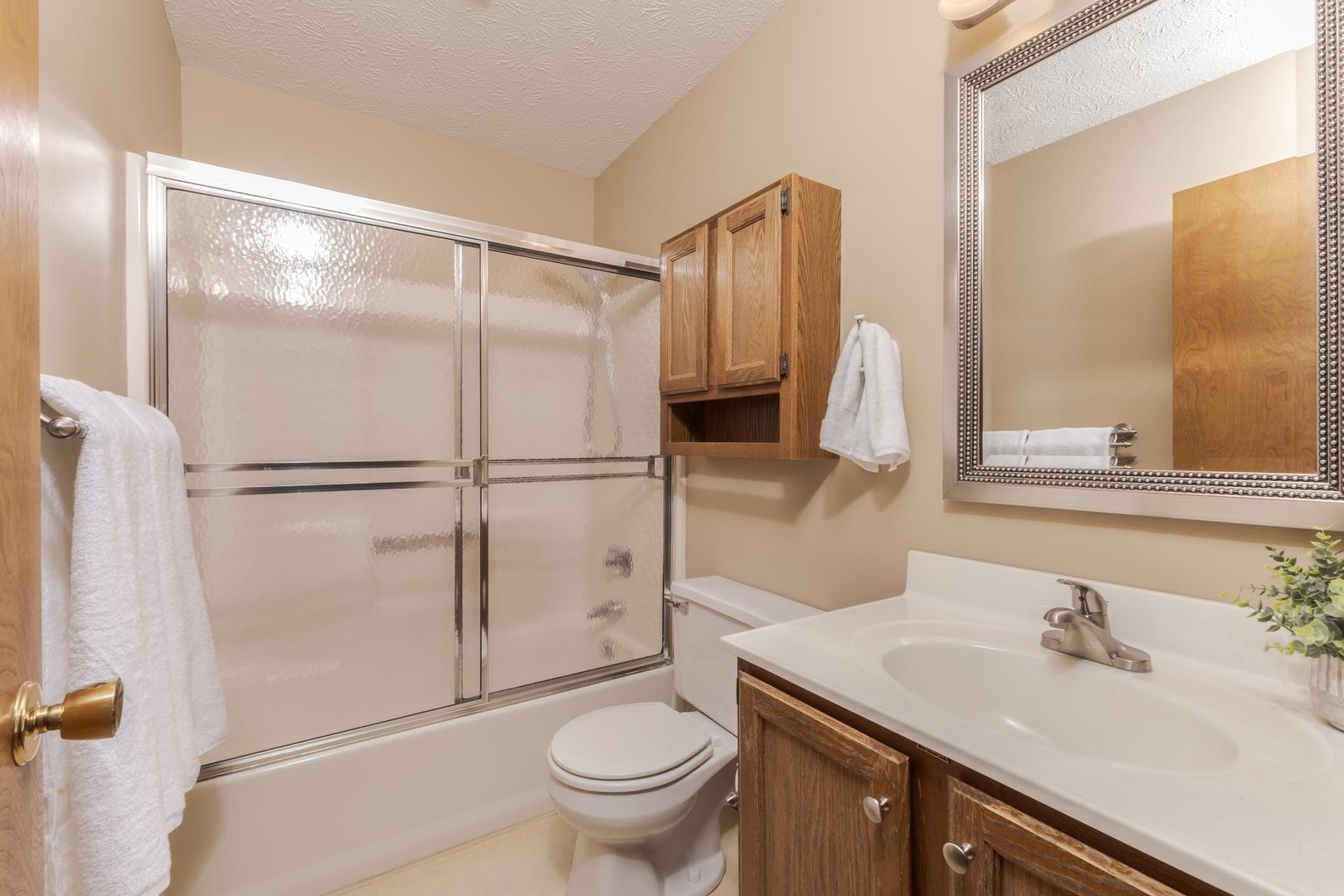 502 Wittenberg Court Normal, IL 61761 - Photo 28 of 41 a bathroom with a sink toilet and shower