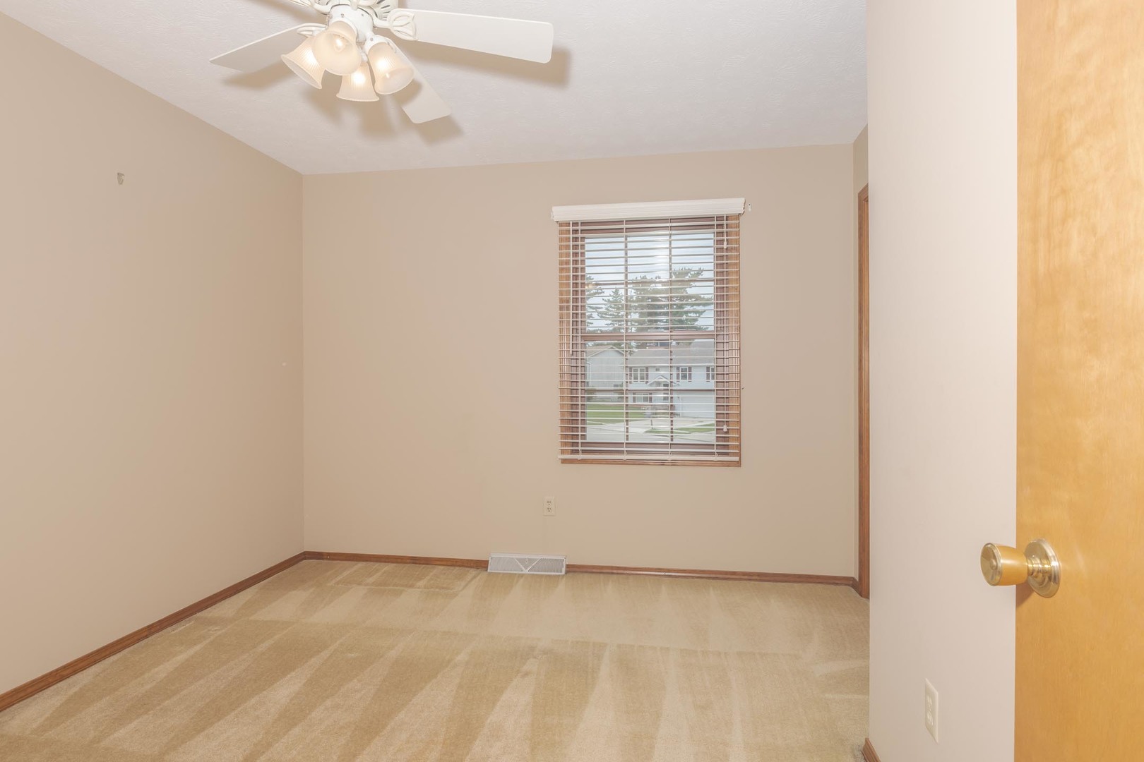 502 Wittenberg Court Normal, IL 61761 - Photo 31 of 41 an empty room with a window