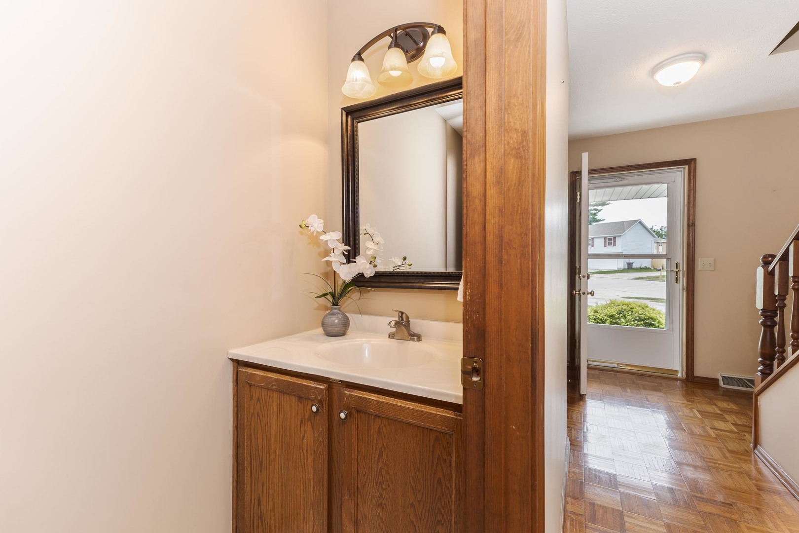 502 Wittenberg Court Normal, IL 61761 - Photo 10 of 41 a bathroom with a sink a vanity and a mirror