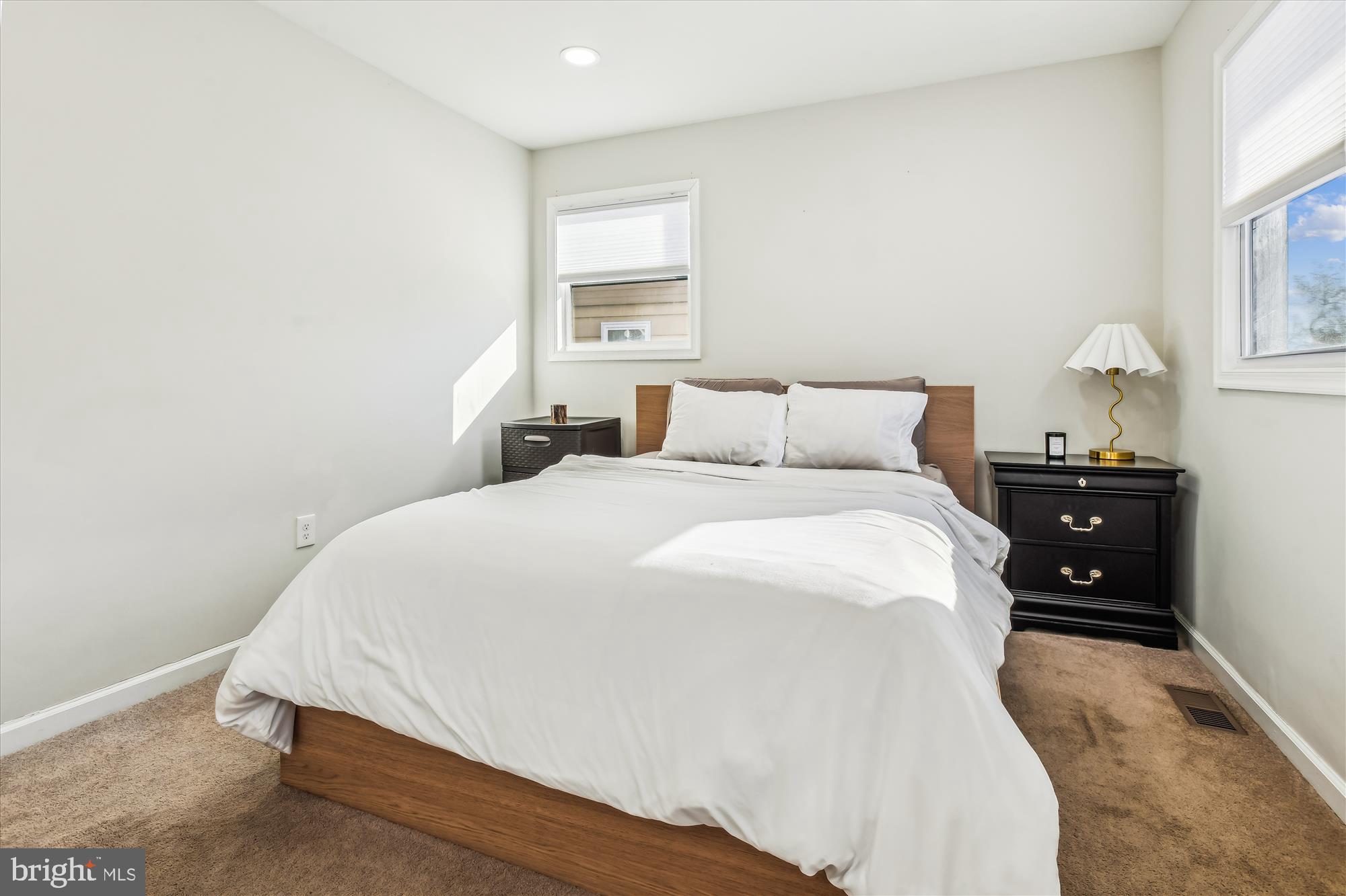 232 Candytuft Road Reisterstown, MD 21136 - Photo 13 of 42 a bedroom with a bed and a window
