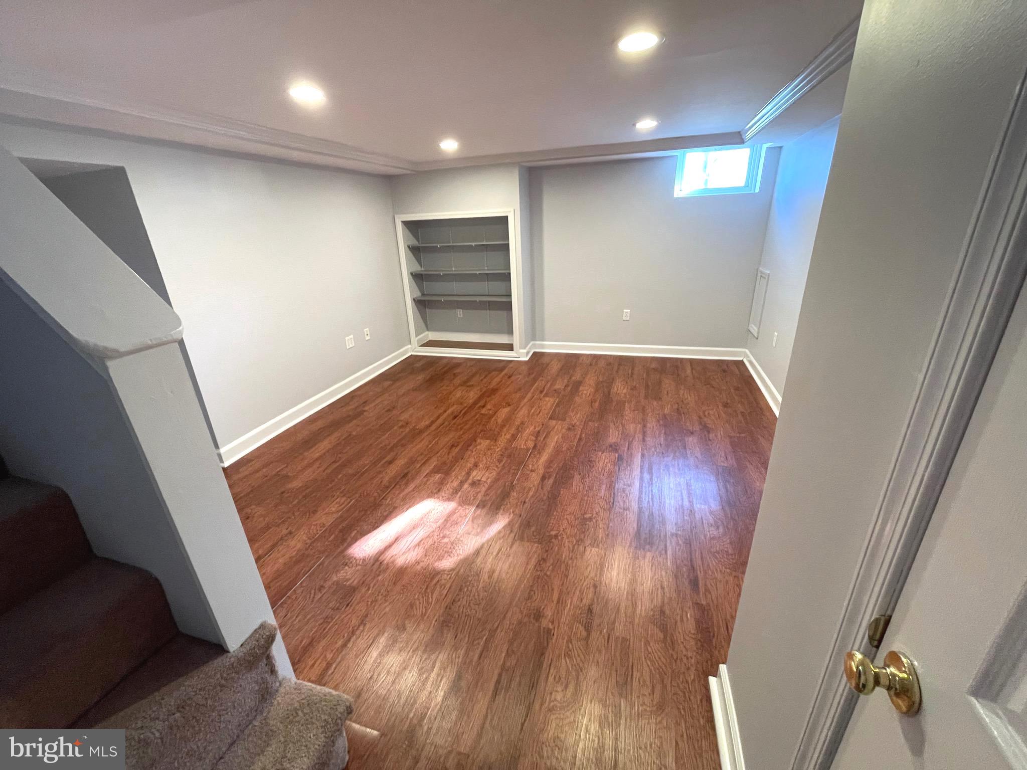 1608 Loch Ness Road Towson, MD 21286 - Photo 25 of 39 Partially Finished Basement with Built In Shelving