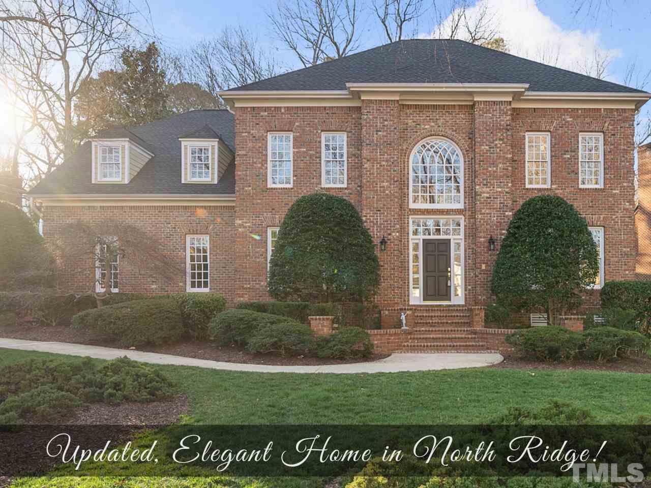 7605 Rainwater Road Raleigh, NC 27615 - Photo 1 of 30 a front view of a house with garden