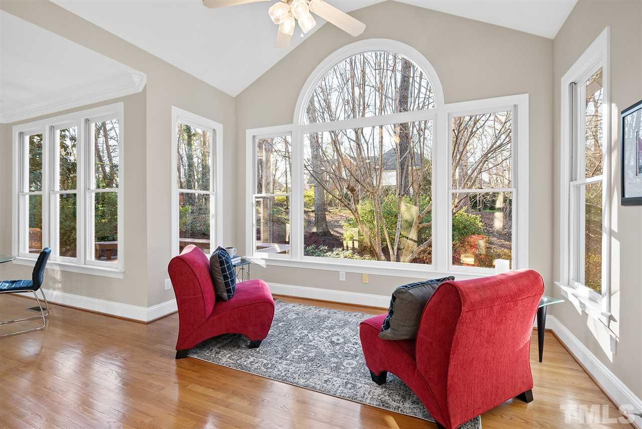 7605 Rainwater Road Raleigh, NC 27615 - Photo 13 of 30 a living room with furniture and a large window