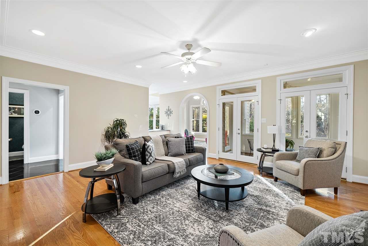 7605 Rainwater Road Raleigh, NC 27615 - Photo 14 of 30 a living room with furniture and a large window